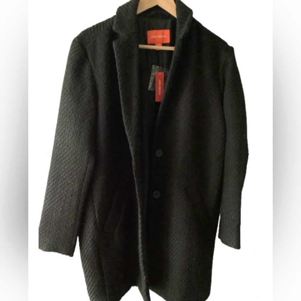 Joe Fresh women’s long black trench coat featuring PrimaLoft insulation.…
